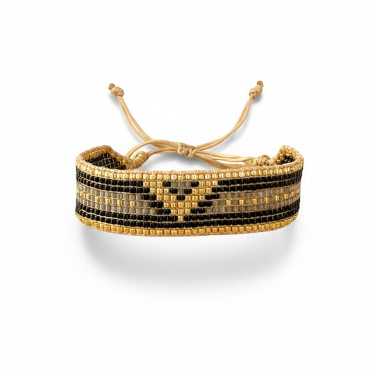 Bracelet Néos en perles Miyuki dorées, noires et grises satinées, tissé à la main.